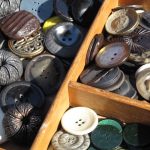 Reema's close up photo of buttons for sale at a street market in Copenhagen - © ReemaFaris.com