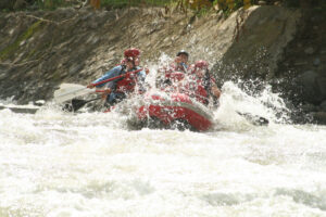 Reema shares an image of a craft in white water river rapids.